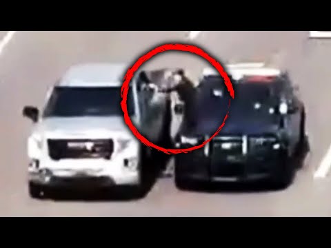 Cop Climbs Into Moving Car to Save Driver During Emergency