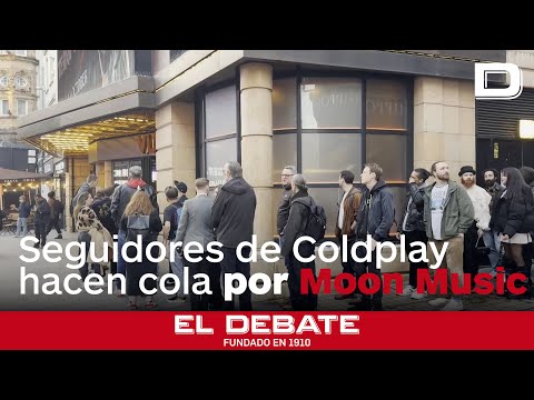 Seguidores de Coldplay hacen cola en un cine de Londres para conocer su décimo álbum «Moon Music»