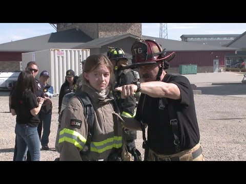 Future Forward High School students work live burn drills