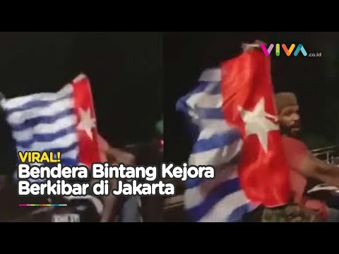 Mahasiswa Papua Ngebut Sambil Kibarkan Bendera Bintang Kejora
