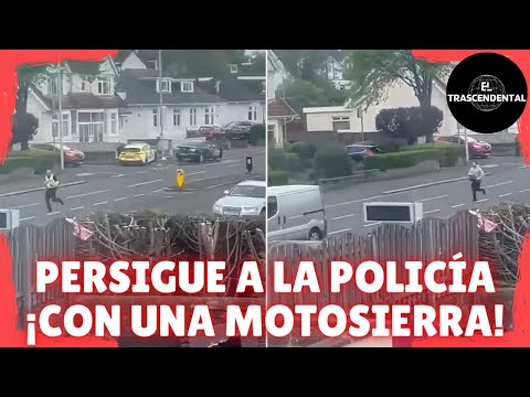 POLICÍA PERSEGUIDO POR UN HOMBRE CON MOTOSIERRA POR LAS CALLES DE GLASGOW, ESCOCIA