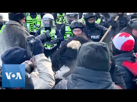 Scuffles in Ottawa as Police Push to Break Up Protests
