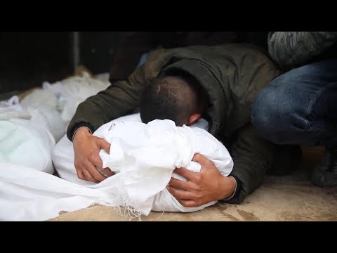 Relatives mourn victims killed in strike in central Gaza
