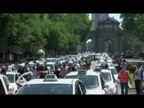 Madrid taxis block city in protest at council