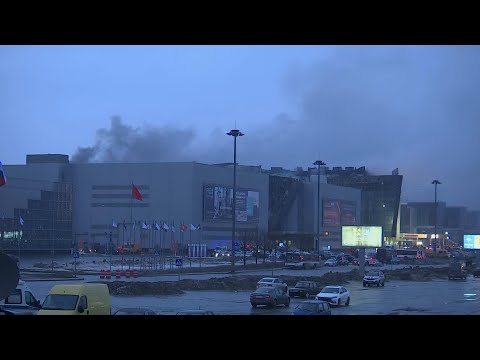 Smoke still rising above Moscow concert hall on morning after mass shooting