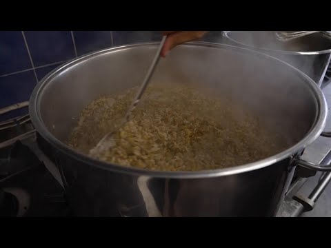 Community kitchen in Beirut prepares hundreds of meals to be sent to schools sheltering displaced pe