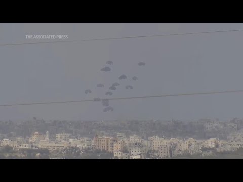 Air drops of aid parachuted into Gaza Strip