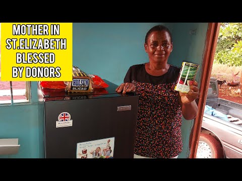 MOTHER IN ST.ELIZABETH BEAMS WITH JOYWHAT A BLESSING FOR MS.MARVA THE PEANUT LADY