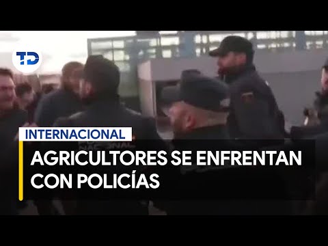 Agricultores y transportistas se enfrentan contra policías en Madrid