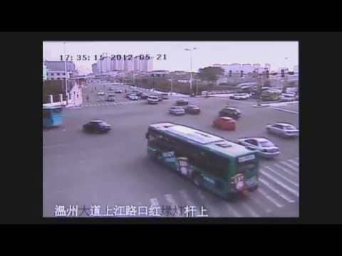 Chinese toddler drives on busy road on toy motorbike