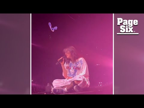 Billie Eilish gets hit in the face by a necklace while performing at Arizona concert