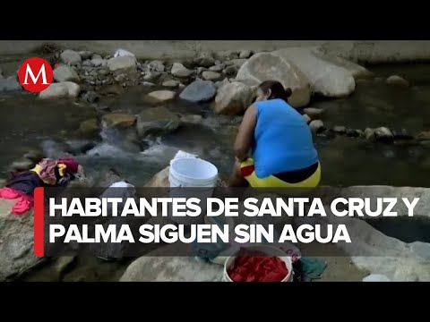 Habitantes de Acapulco acuden a arroyo para bañarse y lavar ropa; siguen sin energía y agua