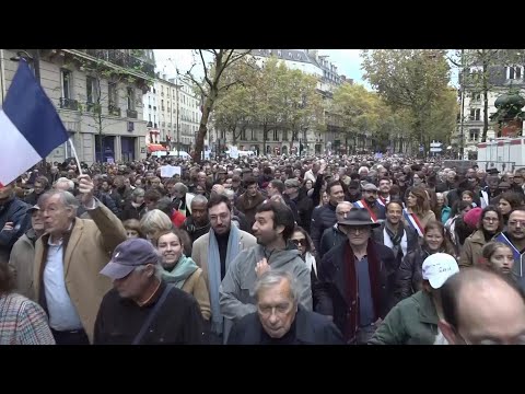 Tens of thousands march in Paris to protest rising antisemitism in wake of Israel-Hamas war