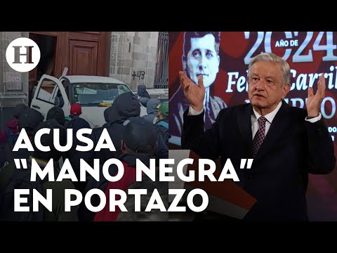 AMLO califica portazo de normalistas en Palacio Nacional como “un vulgar acto de provocación