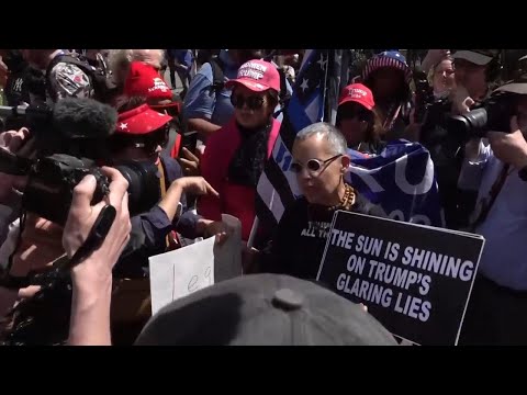Dueling protesters shout and argue outside Donald's Trump's hush money trial