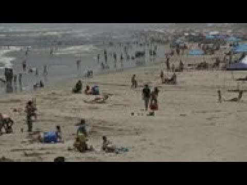Beachgoers pack Texas seafront as lockdown eased