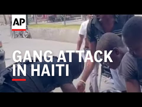 People run as bullets whizzed overheads in another gang attack in Haiti
