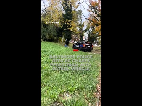Baltimore police officer chases pedestrian with patrol vehicle