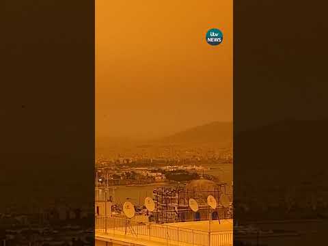 Skies over southern Greece turned orange as dust clouds from North Africa engulfed Athens.