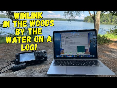 Winlink in the Woods by the Water on a Log.