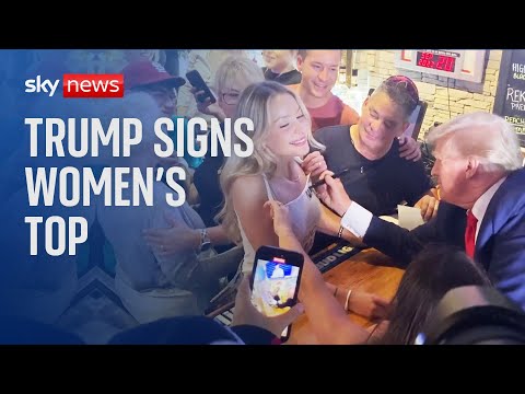 Donald Trump signs woman's top in Iowa restaurant
