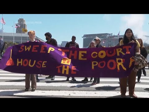 Demonstrators show support for the homeless as Supreme Court hears case