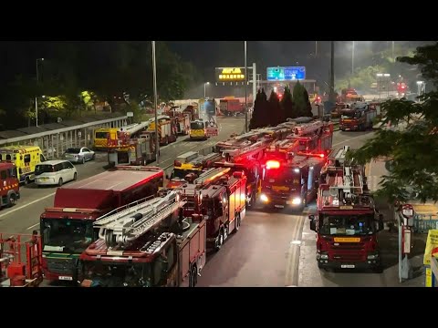 Hong Kong housing blocks still burning as firefighters work to control fire | AFP