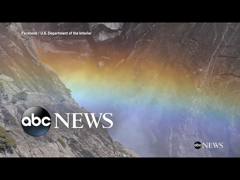 Rainbow forms at Yosemite Falls