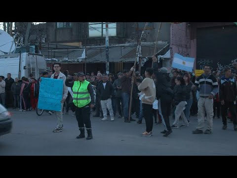 Protesters gather outside Milei's party regional elections closing rally | AFP
