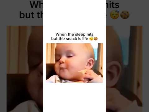 Baby can't choose between sleep and snack 😂💤