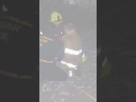 Firefighter cries after learning father was killed metres away