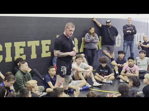Amateur wrestling guru JJ Howland shares his inspiring story with young wrestlers