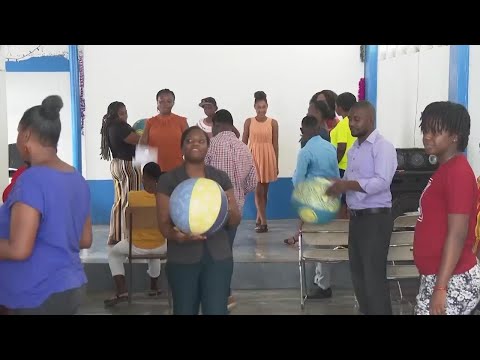 Parents in Haiti are taught how to help their children overcome trauma inflicted by gang violence