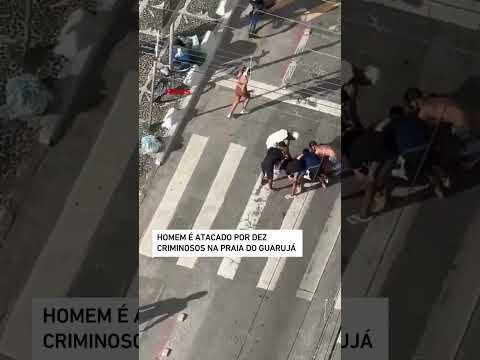 Homem é atacado por dez criminosos na praia do Guarujá #shorts