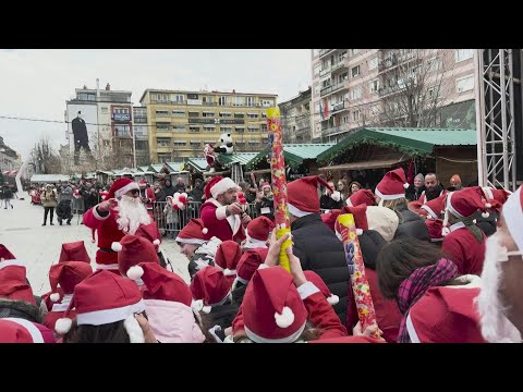 Thousands of Santas race through Kovoso city for charity marathon | AFP