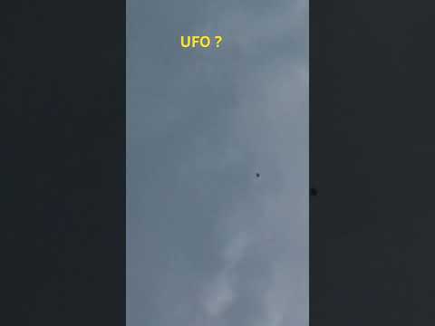 Man stands UFOBangkokThailand18.16pm.ufo