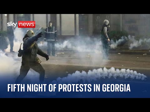 Protesters demonstrate outside Georgian parliament in Tbilisi for a fifth night