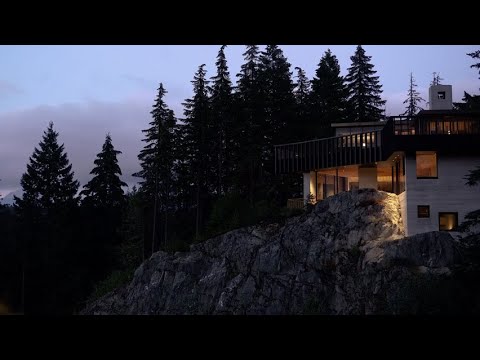 Gort Scott creates drama with concrete house perched over rocky crag in Whistler