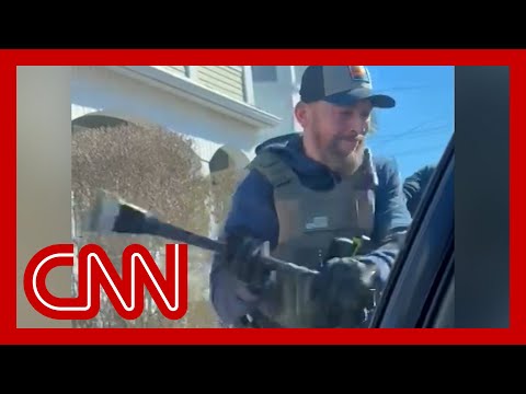 ICE defends agent who smashed car window of undocumented man