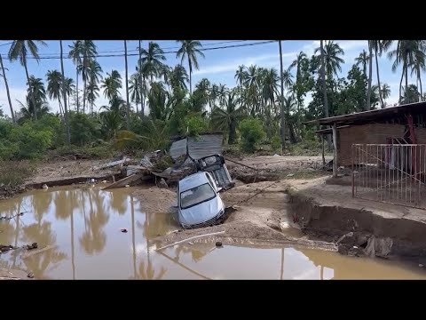 Along Mexico's Pacific coast, flooding from Hurricane John leaves 15 dead