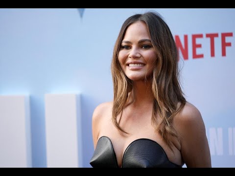 Chrissy Teigen serves up support for service workers