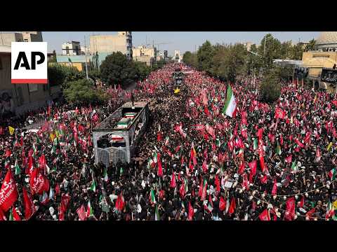 Mourners surround truck carrying Khamenei's casket in Iran
