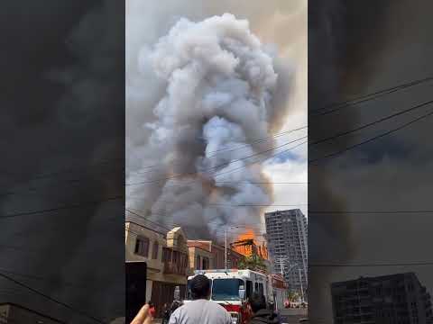 Tower of historic Chilean church tumbles into flames