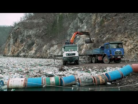 Tons of trash clogs a river in Bosnia. It's a seasonal problem that activists want to end