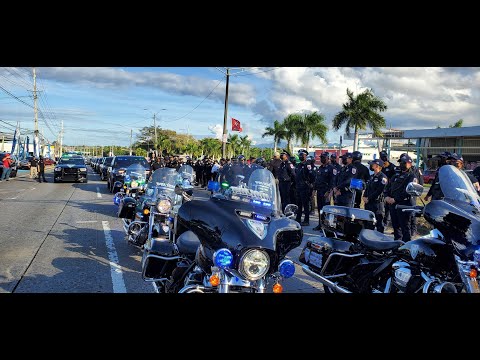 Compañeros rinden tributo de honor a policias caidos en Isla Verde