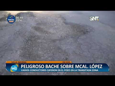 Peligroso bache sobre Mariscal López zona Villa Morra