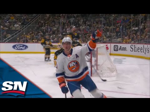 Islanders Nelson Swerves Through Penguins With Some Slick Moves And Backhands It In