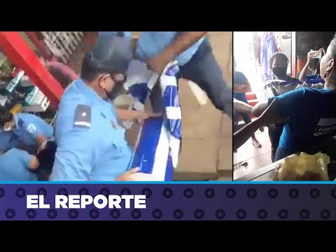 Policía agrede a comerciante y le arrebata banderas de Nicaragua en víspera de fiestas patrias