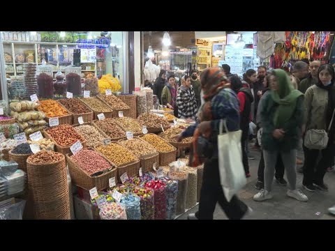 Tehran streets packed with shoppers stocking up with sweets and treats ahead of Nowruz