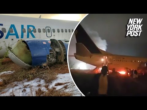 Passengers flee fiery Boeing 737 that skidded off runway in Senegal
